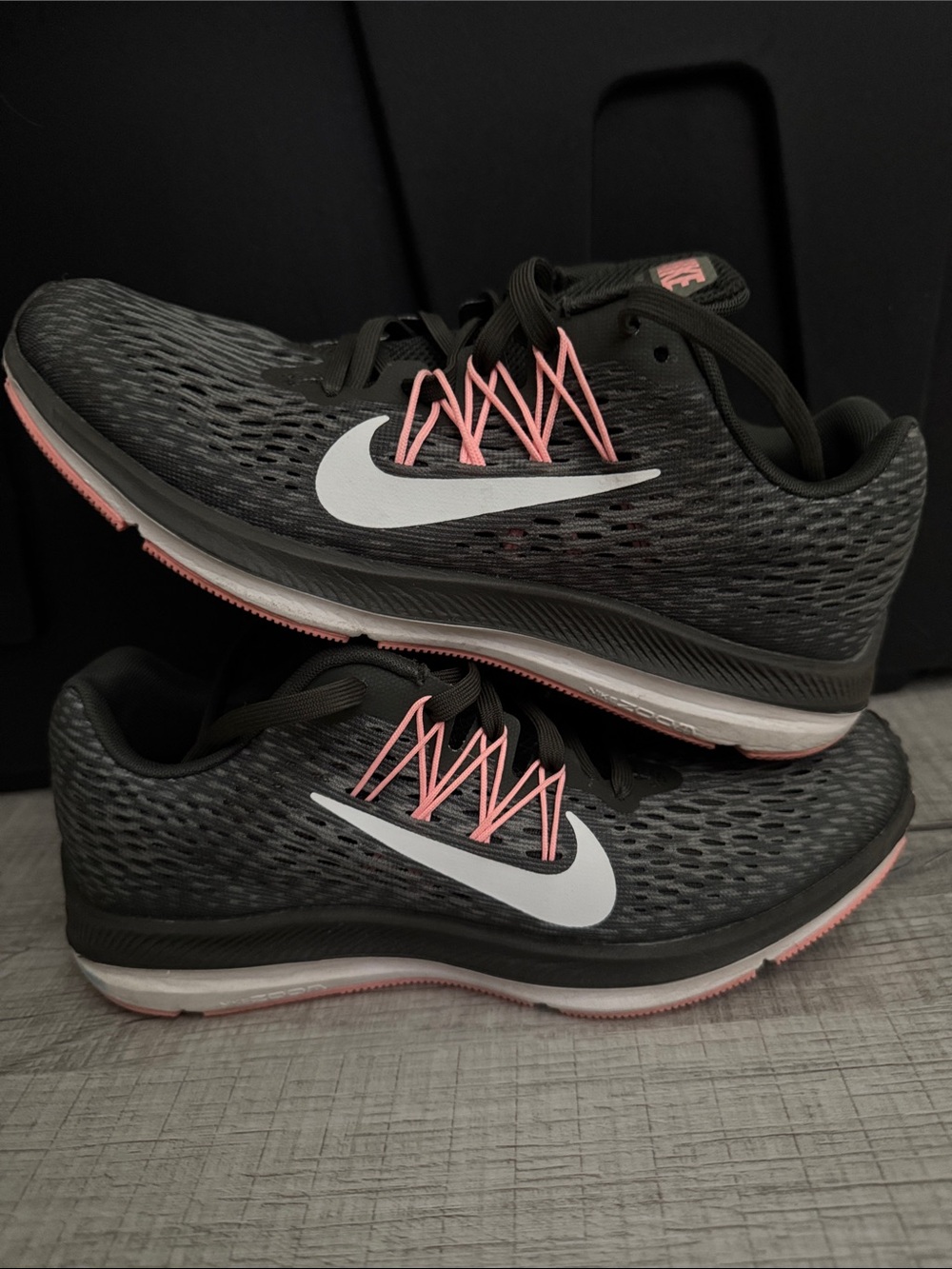 Nike Women's Dark Grey Athletic Shoes with Pink Accents and White Swoosh